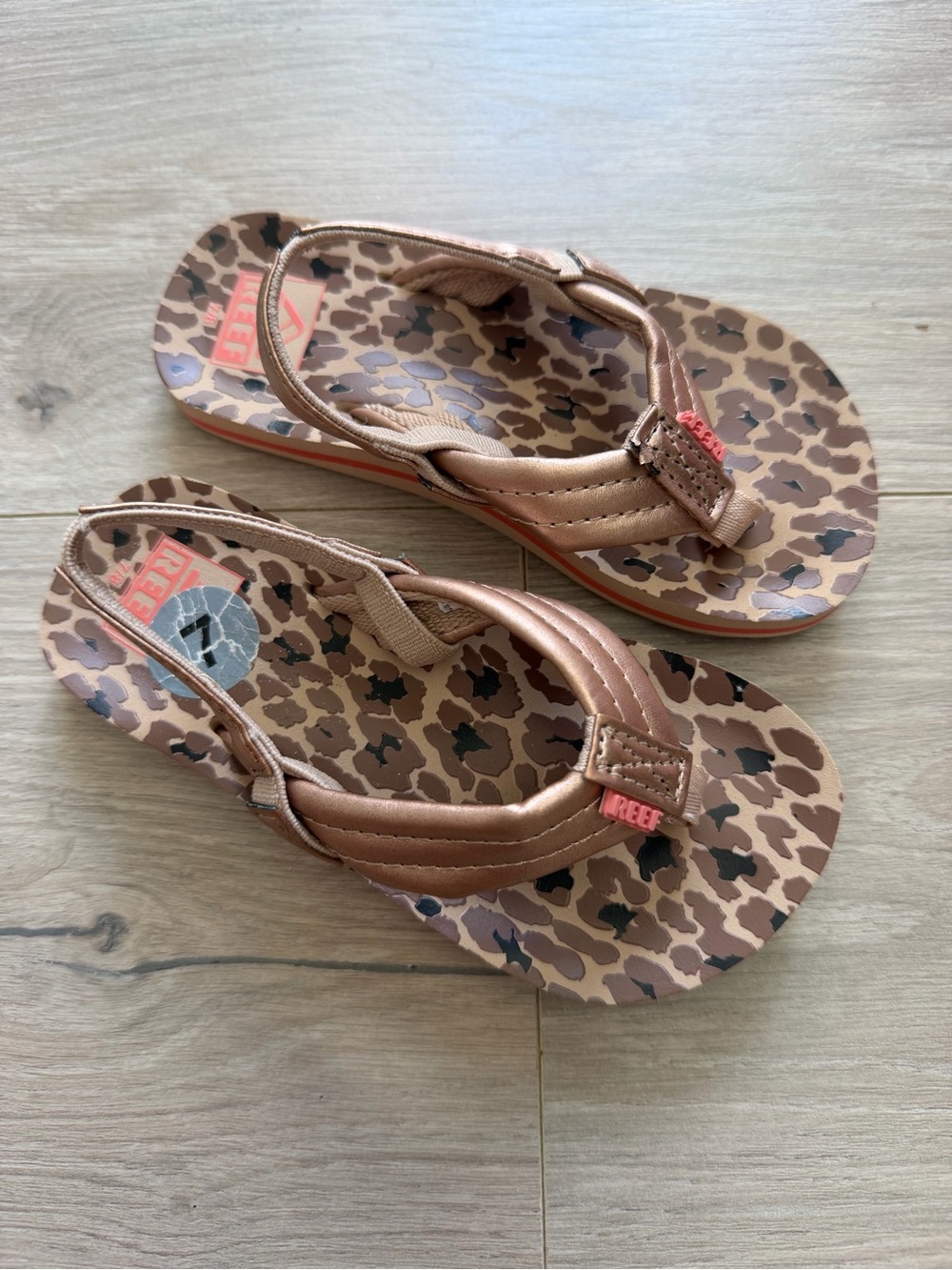 Reef Brown Leopard Print Flip Flops with Metallic Bronze Straps